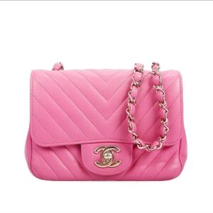 Chanel Mini Flap Bag, a pink lambskin chevron quilted bag with gold hardware